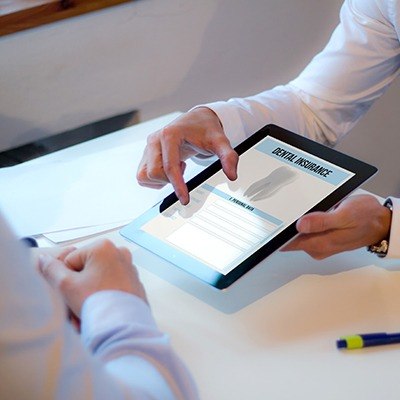 Dental insurance form on tablet computer